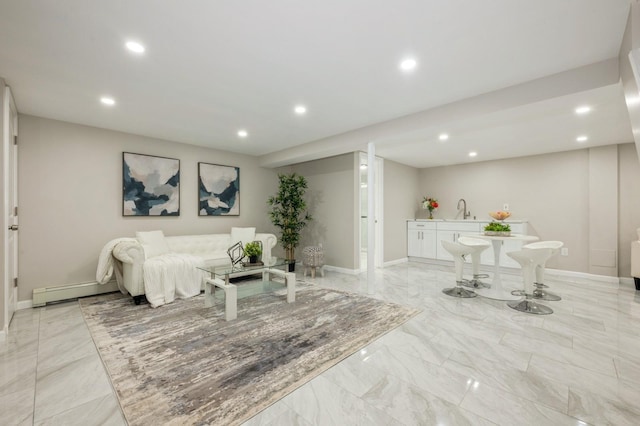 1086 Lehman Rd, West Hempstead, NY 11552 - living room featuring light marble finish floors, recessed lighting, a baseboard radiator, and bar with sink