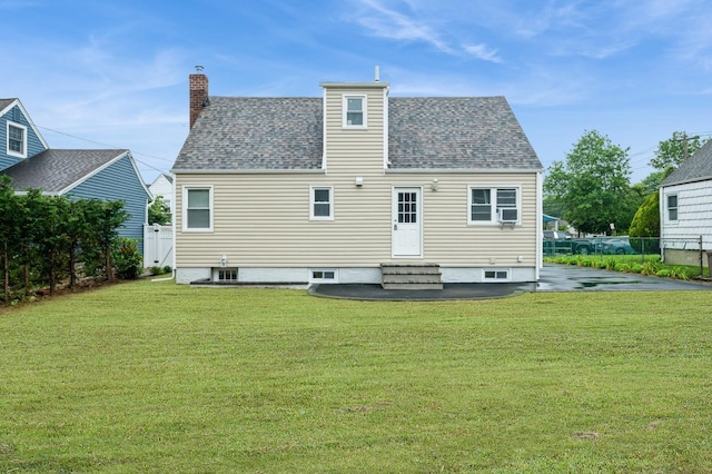 1086 Lehman Rd, West Hempstead, NY 11552 - rear view of property with a chimney, entry steps, and roof with shingles