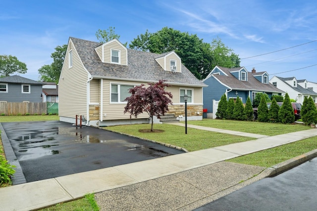 1086 Lehman Rd, West Hempstead, NY 11552 - new england style home with driveway and roof with shingles