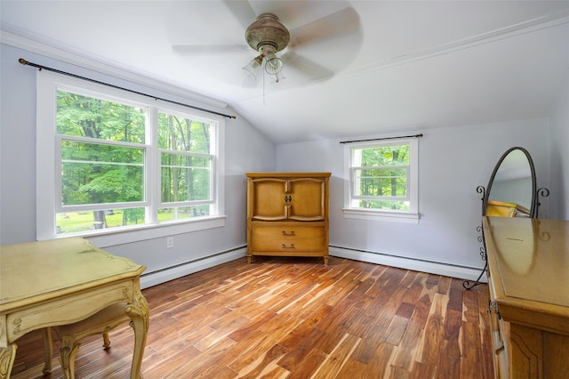 591 Hillside Lake Rd, Wappingers Falls, NY 12590 - bedroom with baseboard heating, lofted ceiling, wood finished floors, and a ceiling fan