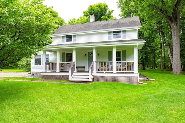 591 Hillside Lake Rd, Wappingers Falls, NY 12590 - view of front of house with a chimney, a porch, a front yard, and roof with shingles