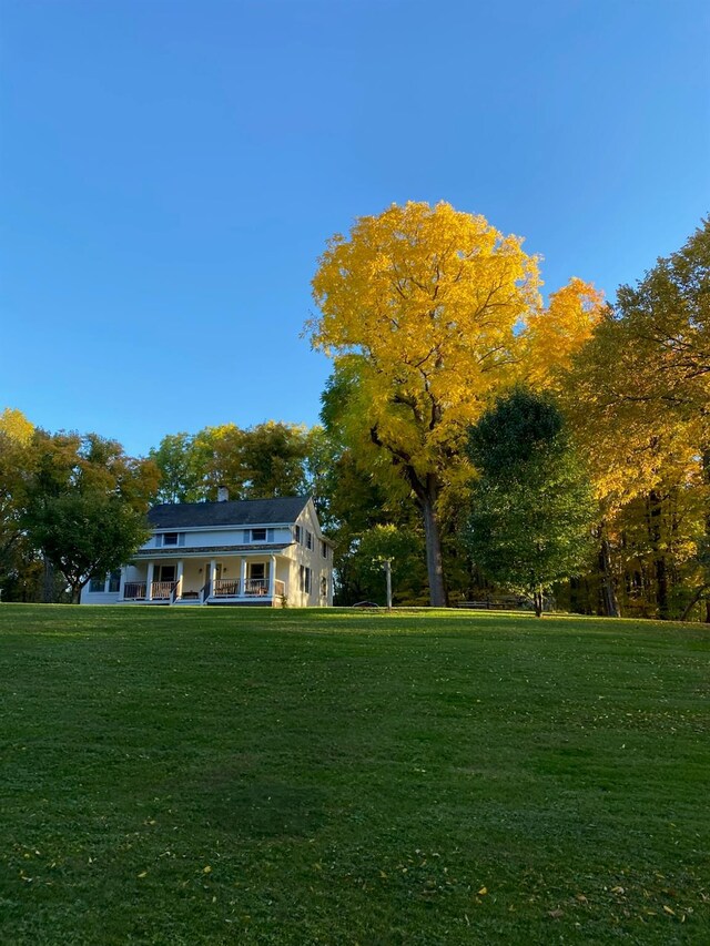 591 Hillside Lake Rd, Wappingers Falls, NY 12590 - view of grassy yard featuring covered porch
