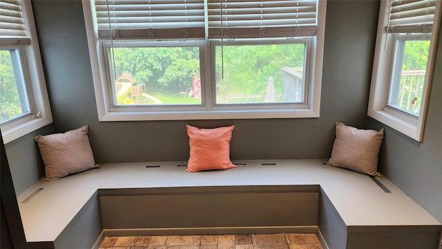 663 N Dunton Ave, East Patchogue, NY 11772 - unfurnished room with healthy amount of natural light and stone finish flooring