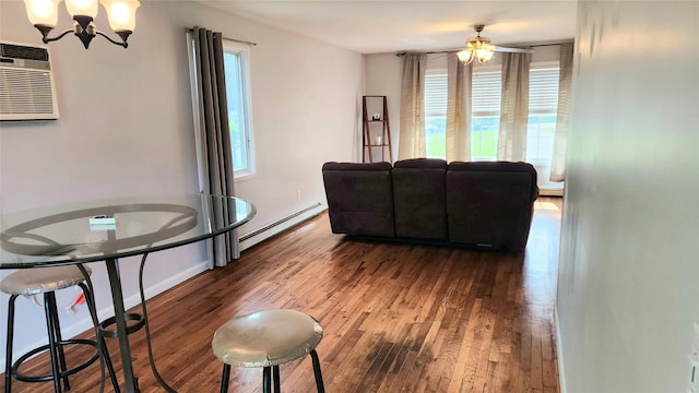 663 N Dunton Ave, East Patchogue, NY 11772 - living area with a chandelier, hardwood / wood-style floors, plenty of natural light, and a ceiling fan