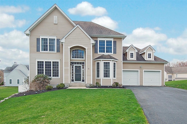 3 Moorefield Cir, Highland Mills, NY 10930 - traditional-style home with driveway, a front yard, and an attached garage