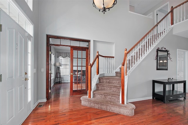 3 Moorefield Cir, Highland Mills, NY 10930 - entrance foyer with a high ceiling, stairs, wood finished floors, and french doors