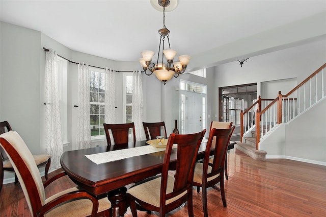 3 Moorefield Cir, Highland Mills, NY 10930 - dining area featuring a chandelier, hardwood / wood-style flooring, and stairs