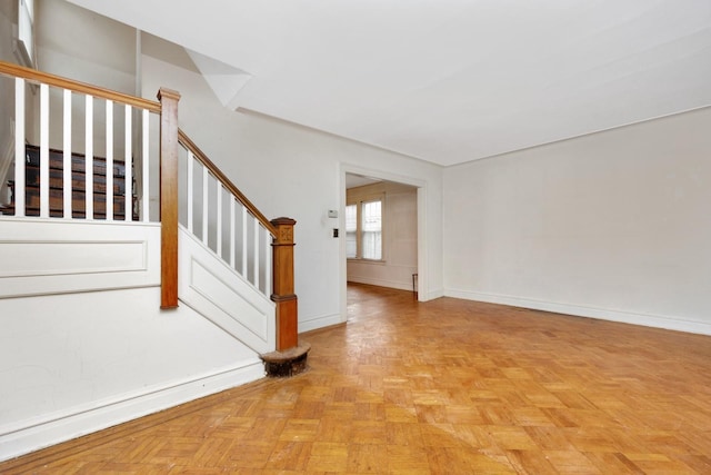 88-11 79th Ave, Glendale, NY 11385 - spare room with stairway and baseboards