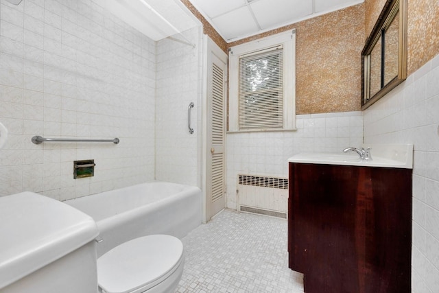 88-11 79th Ave, Glendale, NY 11385 - bathroom with radiator, vanity, tile walls, tile patterned flooring, and tub / shower combination