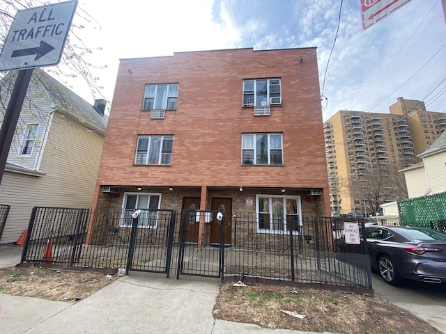 1459 Rosedale Ave, Bronx, NY 10460 - multi unit property featuring a fenced front yard, a gate, and brick siding
