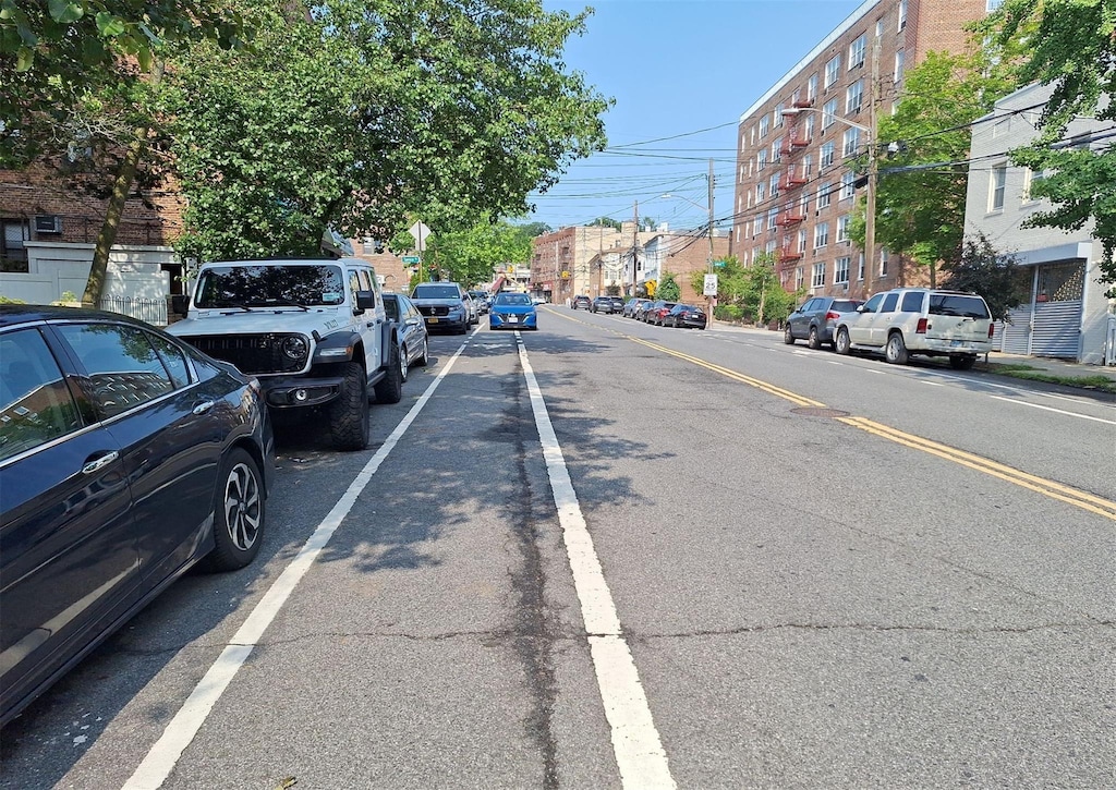 5730 Mosholu Ave Unit 6A, Bronx, NY 10471 - view of asphalt road with street lighting and sidewalks