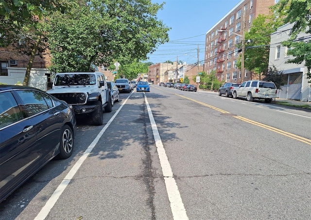 5730 Mosholu Ave Unit 6A, Bronx, NY 10471 - view of asphalt road with street lighting and sidewalks
