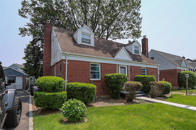 33 Cherry Ln, Carle Place, NY 11514 - new england style home with a chimney and brick siding