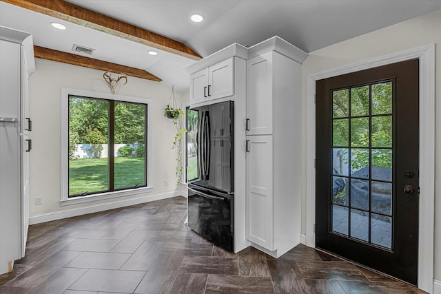 135 Vanderbilt Blvd, Oakdale, NY 11769 - foyer entrance with healthy amount of natural light, beamed ceiling, and recessed lighting