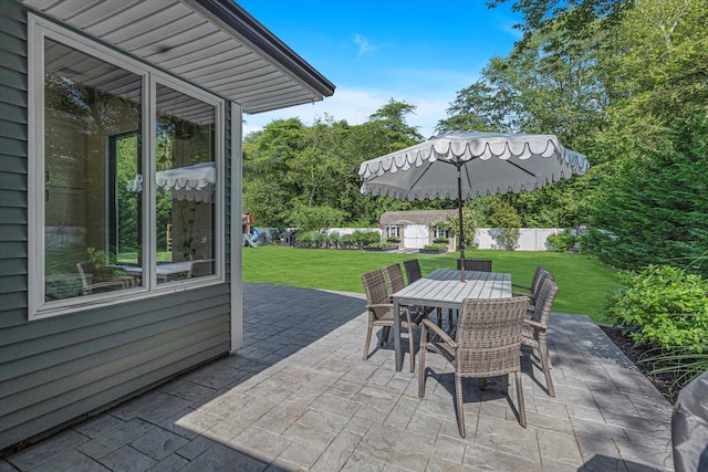 135 Vanderbilt Blvd, Oakdale, NY 11769 - view of patio / terrace featuring outdoor dining area and a storage shed
