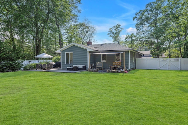 135 Vanderbilt Blvd, Oakdale, NY 11769 - back of house featuring a chimney, a gate, a patio, and an outdoor hangout area