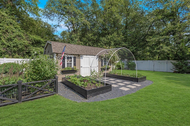 135 Vanderbilt Blvd, Oakdale, NY 11769 - fenced yard featuring a garden and a shed