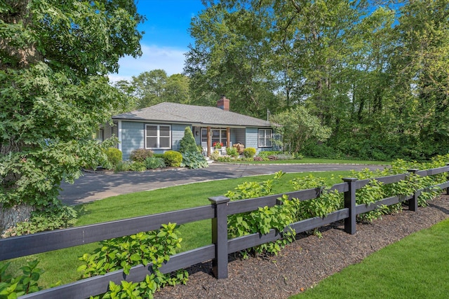 135 Vanderbilt Blvd, Oakdale, NY 11769 - ranch-style house featuring a chimney
