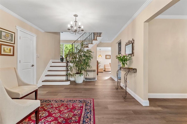 19 Salisbury Dr N, East Northport, NY 11731 - entrance foyer featuring stairs, wood finished floors, a chandelier, and crown molding