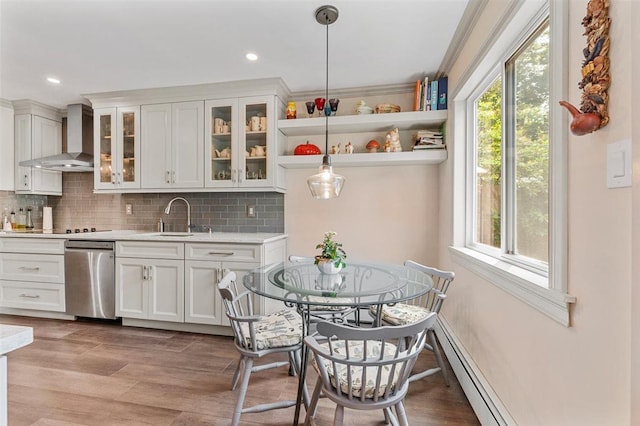 19 Salisbury Dr N, East Northport, NY 11731 - kitchen featuring wall chimney exhaust hood, stainless steel dishwasher, light countertops, plenty of natural light, and recessed lighting
