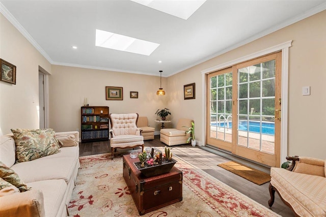 19 Salisbury Dr N, East Northport, NY 11731 - living area featuring a skylight, ornamental molding, light wood-style flooring, and recessed lighting