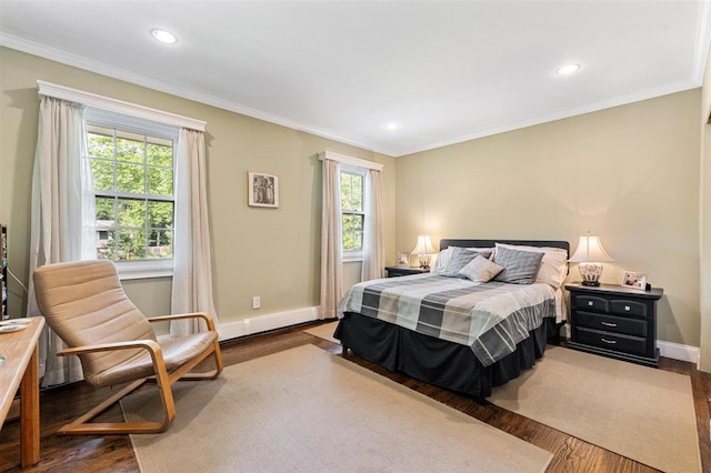 19 Salisbury Dr N, East Northport, NY 11731 - bedroom with multiple windows, wood finished floors, ornamental molding, and recessed lighting