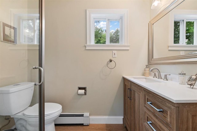 19 Salisbury Dr N, East Northport, NY 11731 - bathroom featuring a baseboard heating unit and vanity