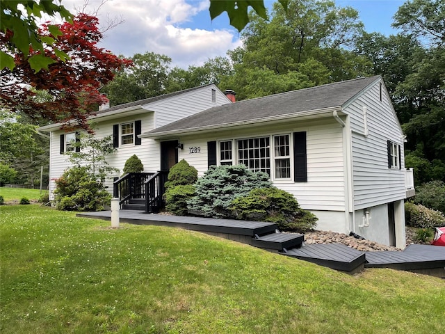1289 State Route 208, Wallkill, NY 12589 - split level home with a chimney and a front lawn