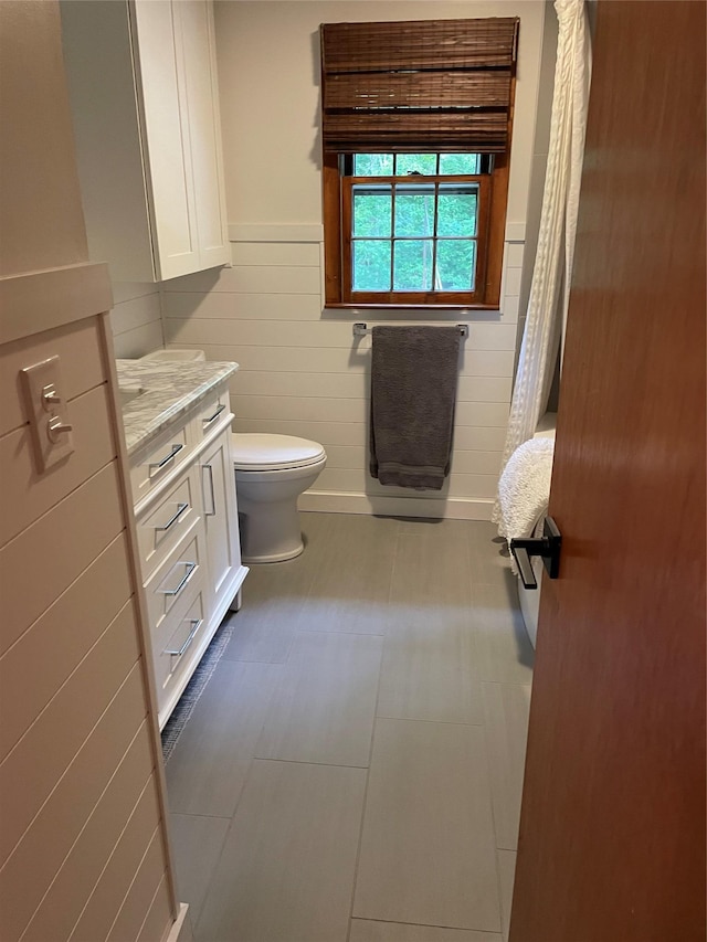 1289 State Route 208, Wallkill, NY 12589 - full bathroom with a wainscoted wall, vanity, and tile walls