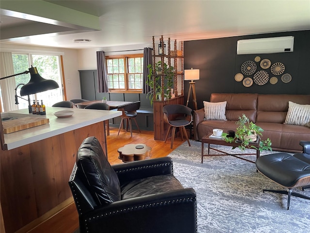 1289 State Route 208, Wallkill, NY 12589 - living room featuring a wall mounted air conditioner and wood finished floors