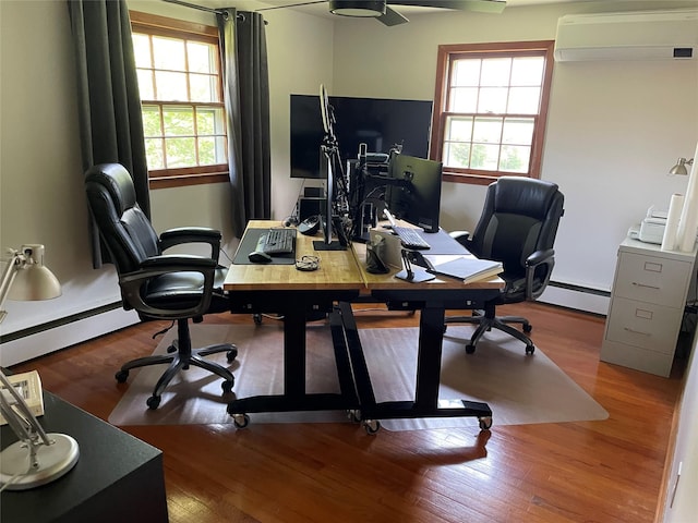 1289 State Route 208, Wallkill, NY 12589 - office area with a wall mounted AC, a baseboard heating unit, and wood finished floors