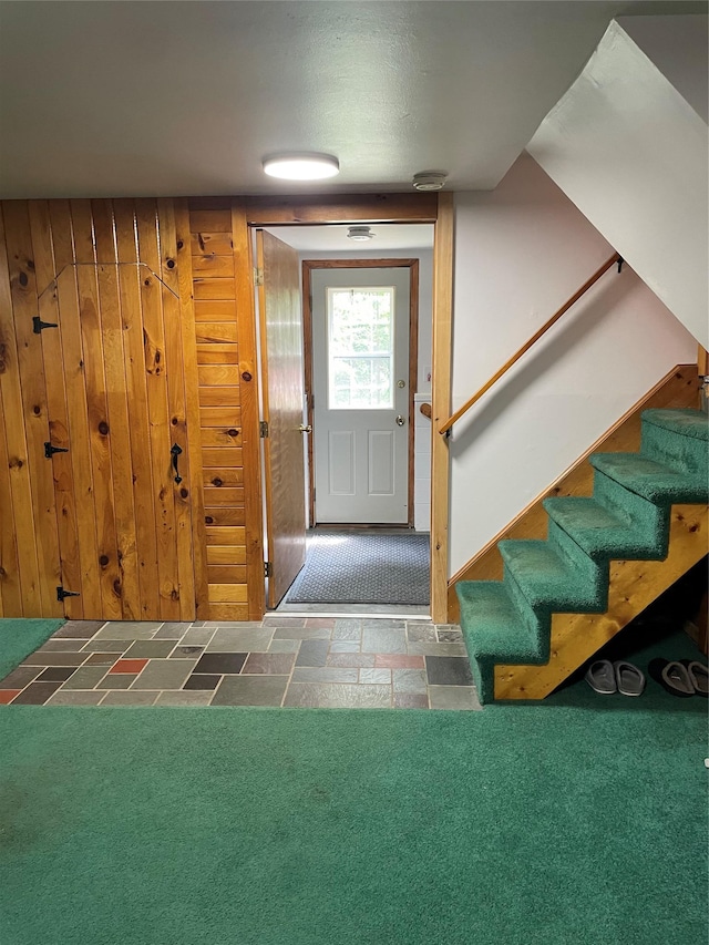1289 State Route 208, Wallkill, NY 12589 - entryway with stone tile floors, stairway, and wooden walls
