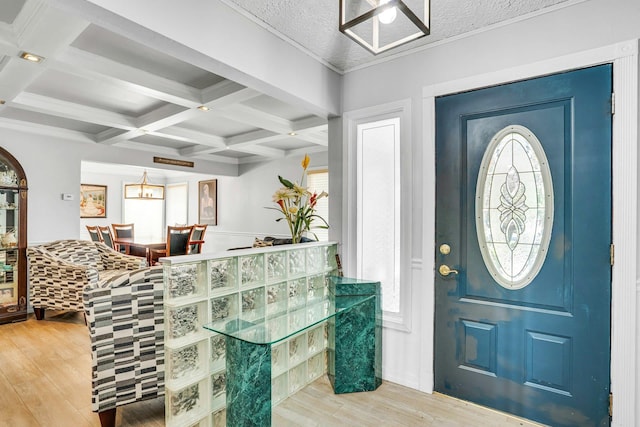 20 Wiltshire Dr, Commack, NY 11725 - entrance foyer featuring wood finished floors, beam ceiling, healthy amount of natural light, and coffered ceiling