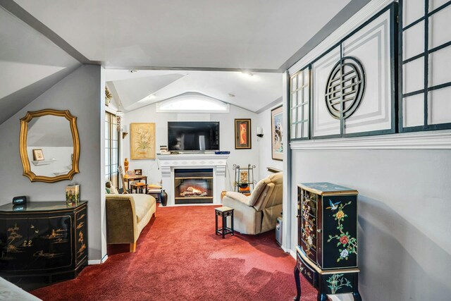 20 Wiltshire Dr, Commack, NY 11725 - carpeted living area featuring a glass covered fireplace and lofted ceiling