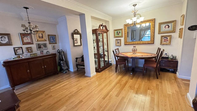 99-05 63rd Dr Unit 11Aa, Rego Park, NY 11374 - dining space featuring a chandelier, light wood-style floors, and crown molding
