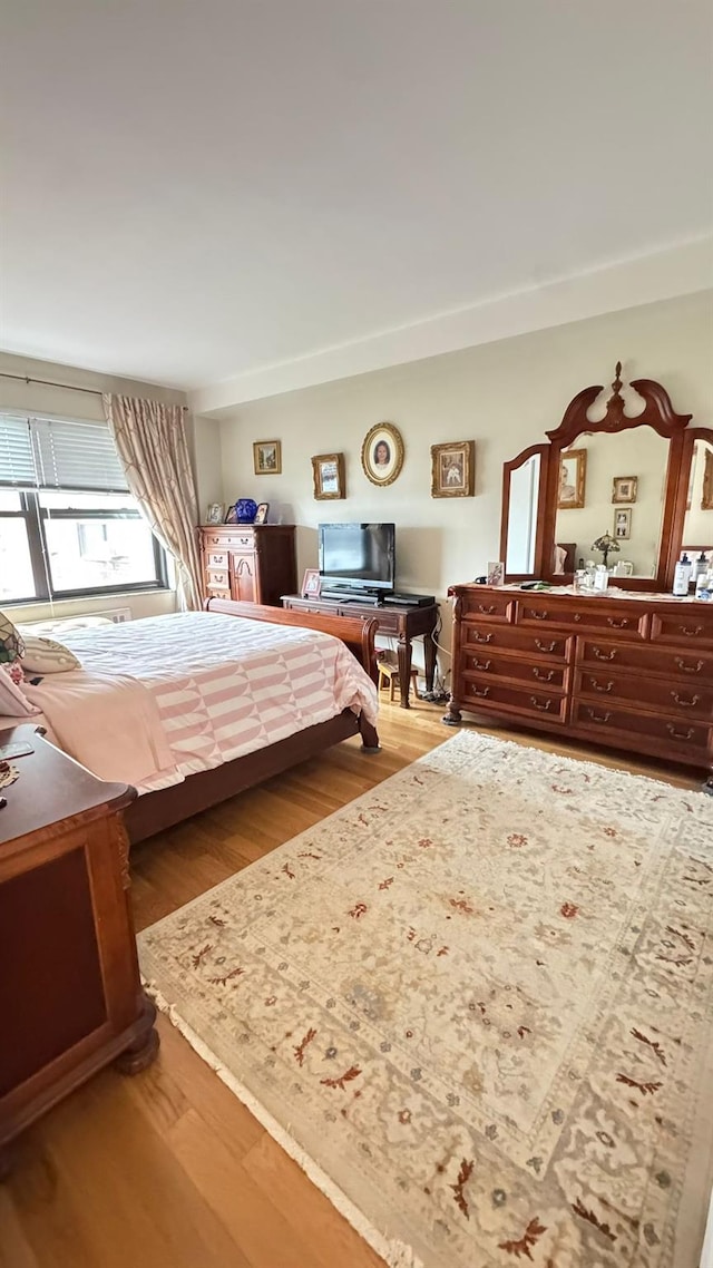99-05 63rd Dr Unit 11Aa, Rego Park, NY 11374 - bedroom with wood finished floors