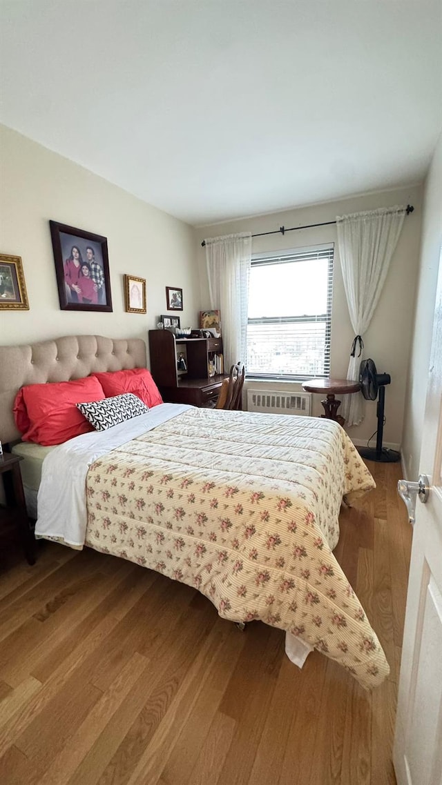99-05 63rd Dr Unit 11Aa, Rego Park, NY 11374 - bedroom with wood finished floors