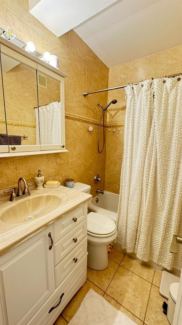 99-05 63rd Dr Unit 11Aa, Rego Park, NY 11374 - bathroom with vanity, shower / bath combo with shower curtain, tile patterned floors, and tile walls