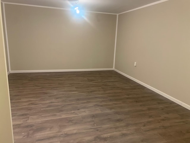7 Shady Ln Unit 1, Central Islip, NY 11722 - empty room with crown molding and dark wood-type flooring