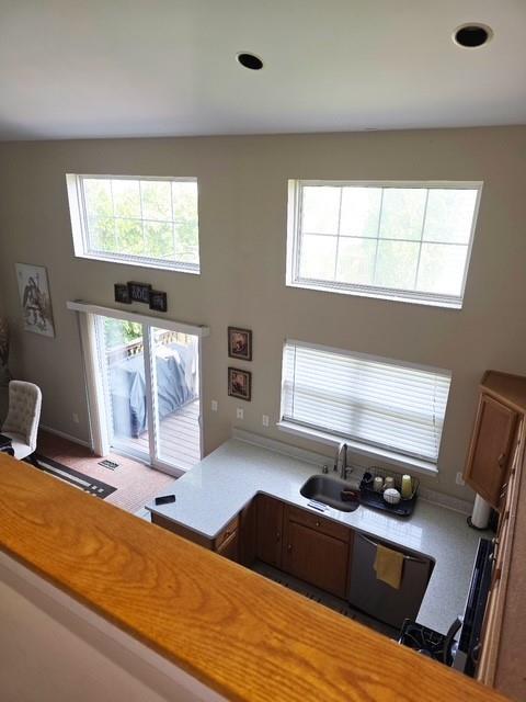 7 Shady Ln Unit 1, Central Islip, NY 11722 - kitchen featuring plenty of natural light, light countertops, dishwashing machine, and recessed lighting