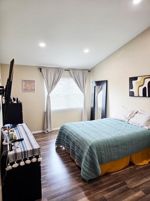 7 Shady Ln Unit 1, Central Islip, NY 11722 - bedroom with wood finished floors, recessed lighting, and vaulted ceiling
