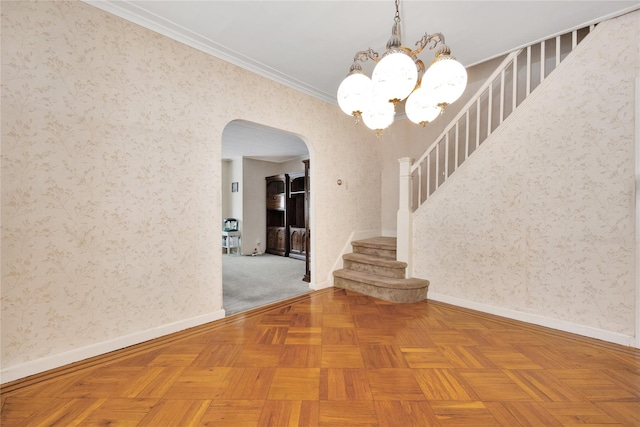 6438 60th Rd, Maspeth, NY 11378 - empty room featuring arched walkways, stairway, a chandelier, wallpapered walls, and crown molding