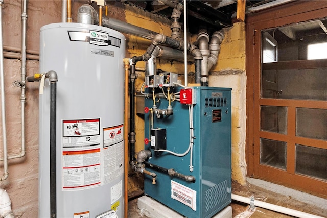 6438 60th Rd, Maspeth, NY 11378 - utility room featuring water heater