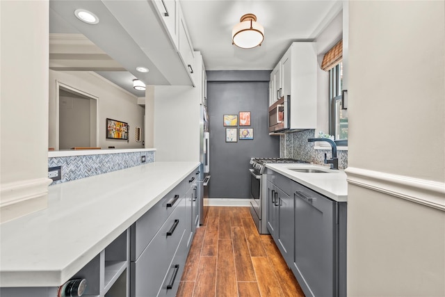 3103 Fairfield Ave Unit 4A, Bronx, NY 10463 - kitchen featuring appliances with stainless steel finishes, gray cabinetry, light countertops, and recessed lighting