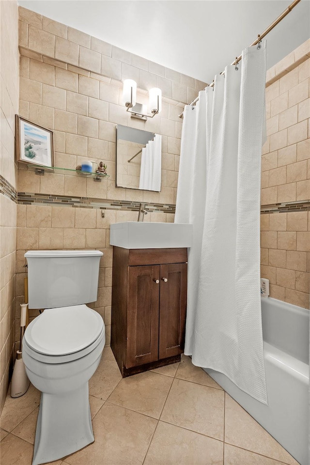 3103 Fairfield Ave Unit 4A, Bronx, NY 10463 - full bath featuring tile patterned flooring, vanity, shower / bathtub combination with curtain, and tile walls