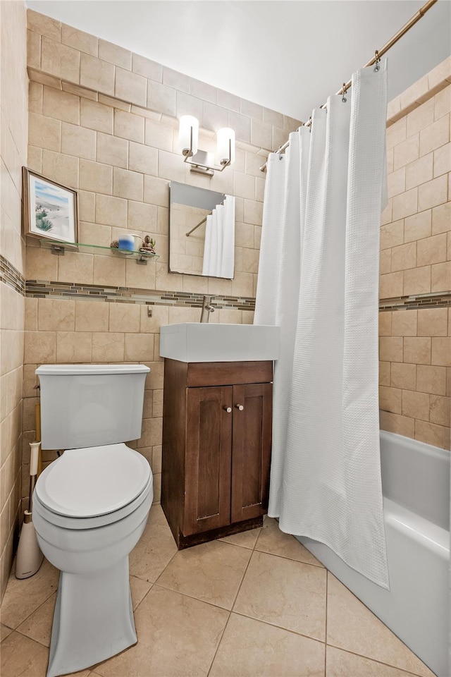 3103 Fairfield Ave Unit 4A, Bronx, NY 10463 - full bathroom featuring tile patterned flooring, vanity, shower / bathtub combination with curtain, and tile walls
