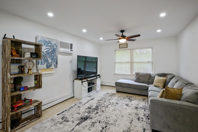 27 The Plains Rd, Levittown, NY 11756 - living room with a baseboard heating unit, a ceiling fan, a wall unit AC, recessed lighting, and wood finished floors