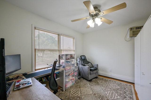 27 The Plains Rd, Levittown, NY 11756 - office with a baseboard radiator, a ceiling fan, and wood finished floors