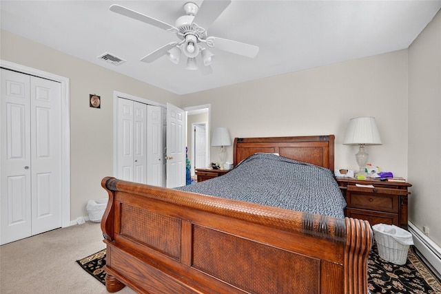 4 Debbie Ct, Chester, NY 10918 - bedroom with baseboard heating, multiple closets, carpet floors, and a ceiling fan