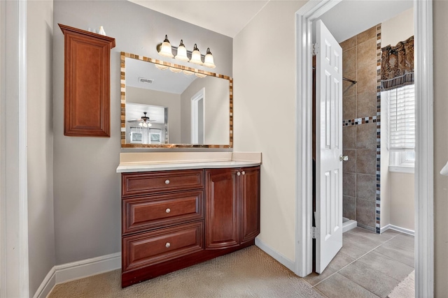 4 Debbie Ct, Chester, NY 10918 - bathroom featuring tiled shower, vanity, and a ceiling fan